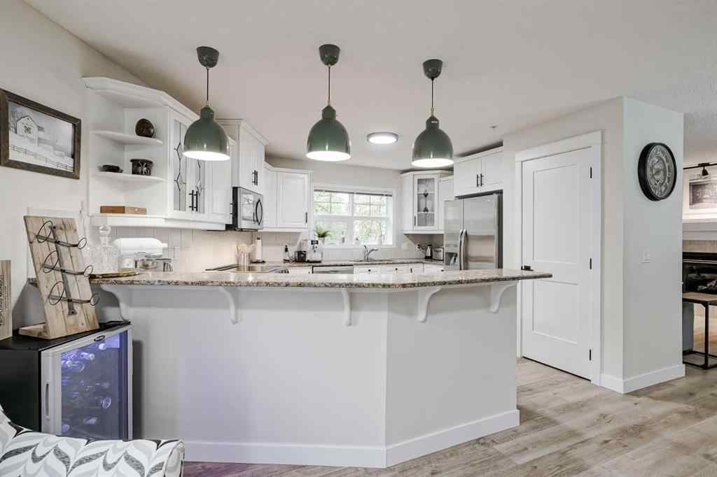 MLS® A2256132 - Unit #201 40 Parkridge View SE in Parkland Calgary, Residential