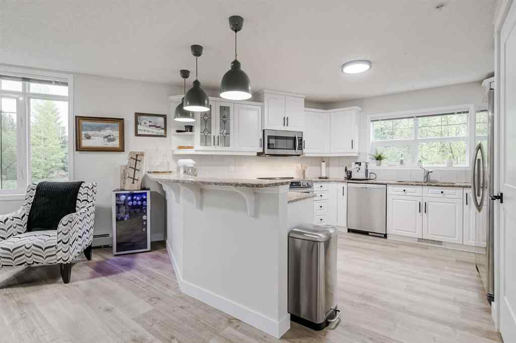 MLS® A2256132 - Unit #201 40 Parkridge View SE in Parkland Calgary, Residential