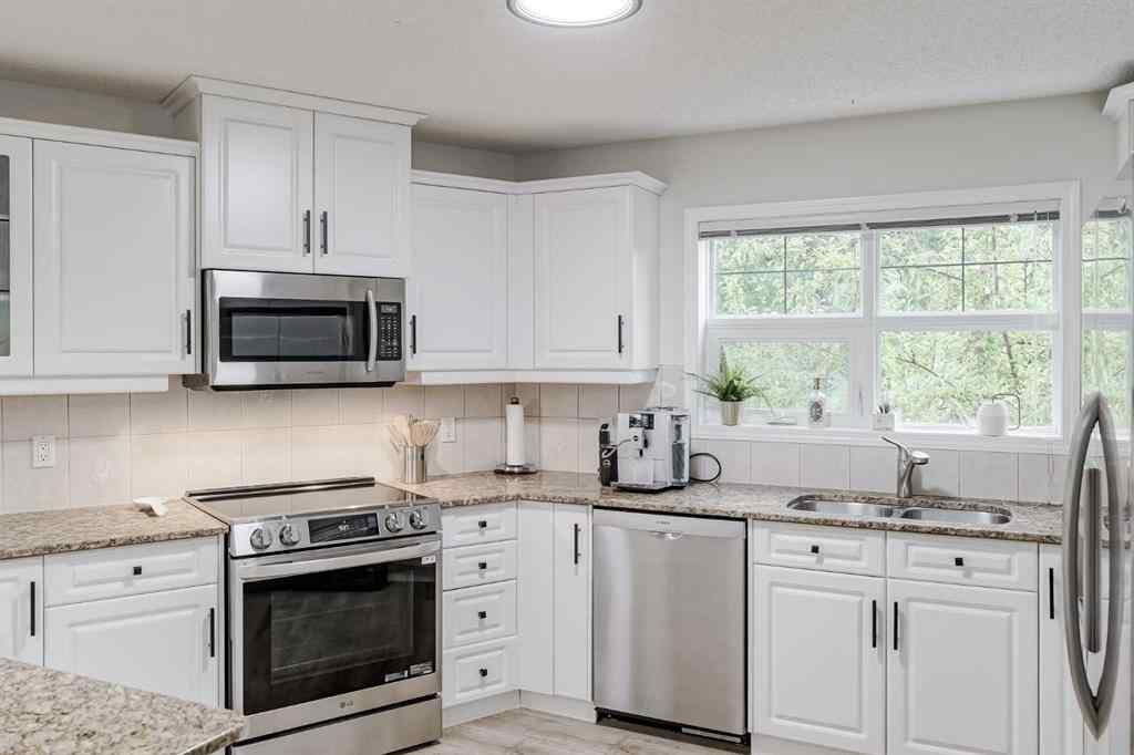 MLS® A2256132 - Unit #201 40 Parkridge View SE in Parkland Calgary, Residential