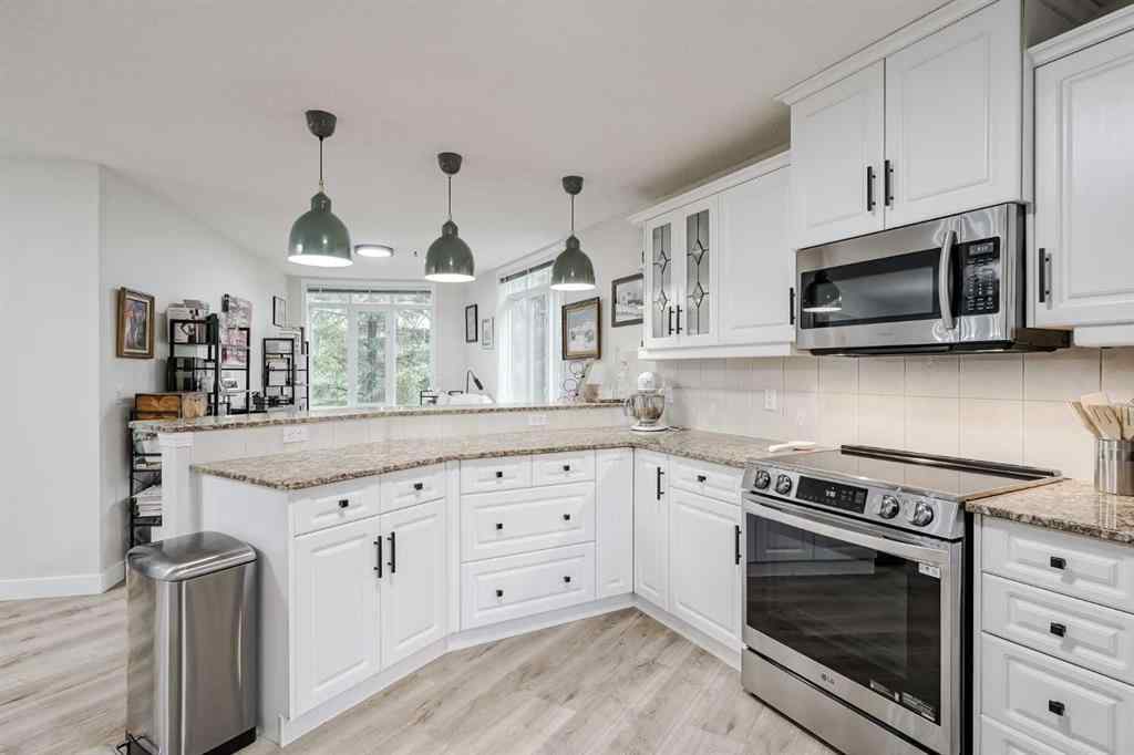 MLS® A2256132 - Unit #201 40 Parkridge View SE in Parkland Calgary, Residential