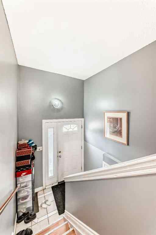 MLS® A2256139 - 203 Penbrooke Close SE in Penbrooke Meadows Calgary, Residential