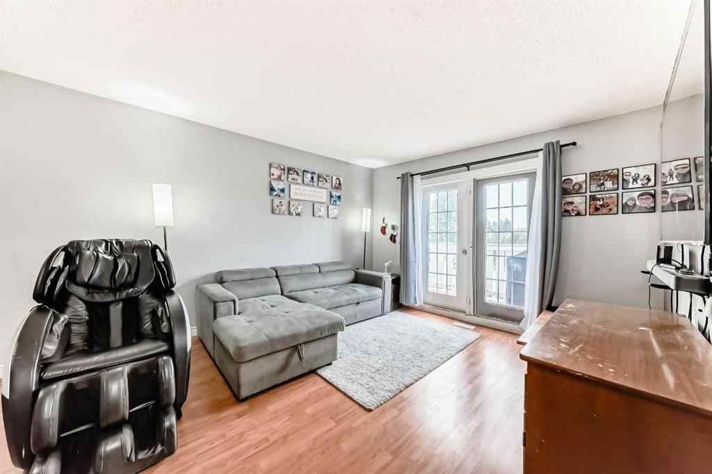MLS® A2256139 - 203 Penbrooke Close SE in Penbrooke Meadows Calgary, Residential