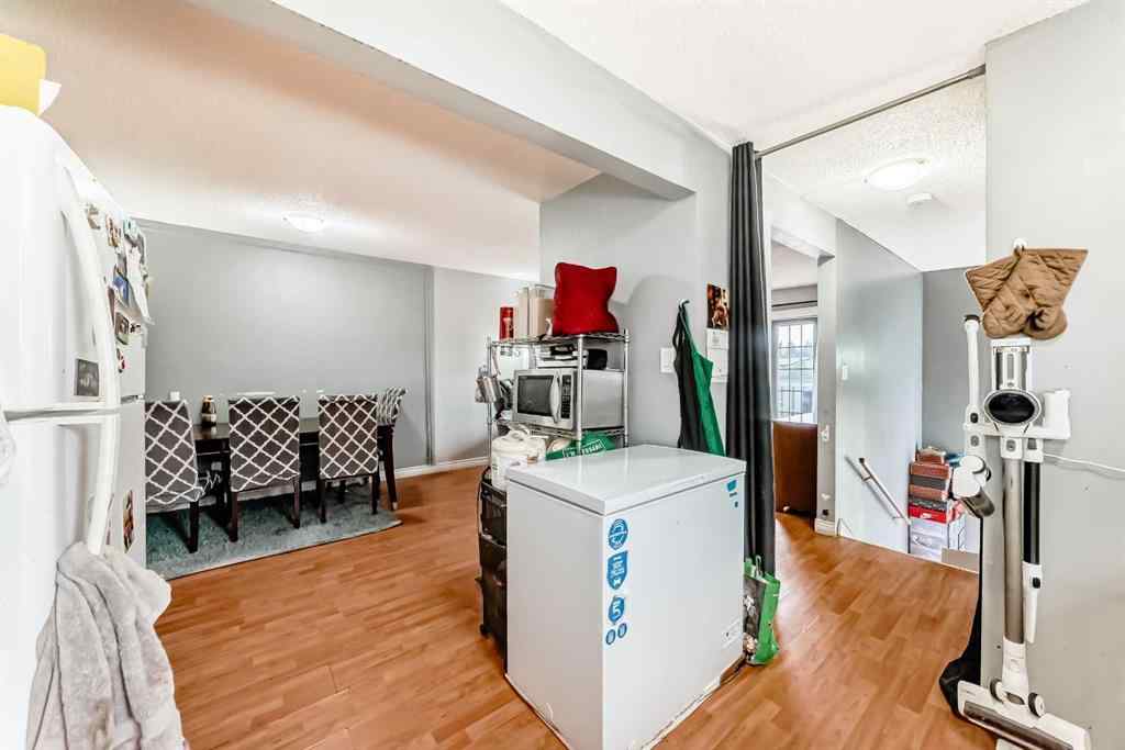 MLS® A2256139 - 203 Penbrooke Close SE in Penbrooke Meadows Calgary, Residential