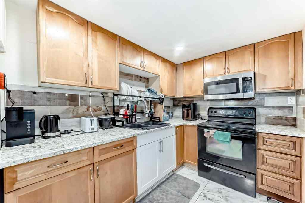 MLS® A2256139 - 203 Penbrooke Close SE in Penbrooke Meadows Calgary, Residential
