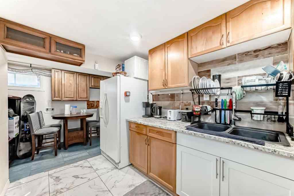 MLS® A2256139 - 203 Penbrooke Close SE in Penbrooke Meadows Calgary, Residential