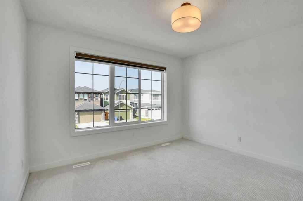 MLS® A2256143 - 35 Walcrest Manor SE in Walden Calgary, Residential