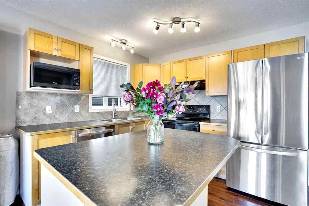MLS® A2256152 - 96 Eversyde Circle SW in Evergreen Calgary, Residential