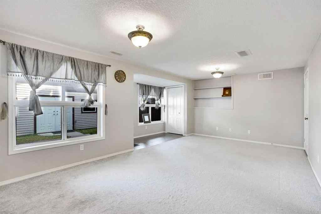 MLS® A2256152 - 96 Eversyde Circle SW in Evergreen Calgary, Residential