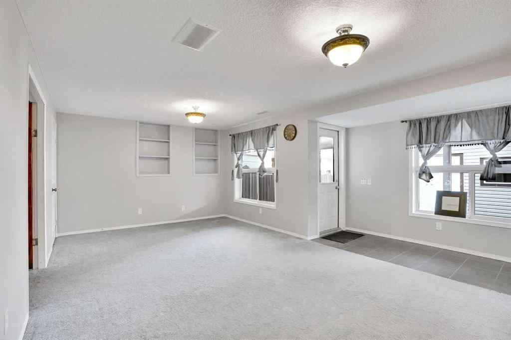 MLS® A2256152 - 96 Eversyde Circle SW in Evergreen Calgary, Residential