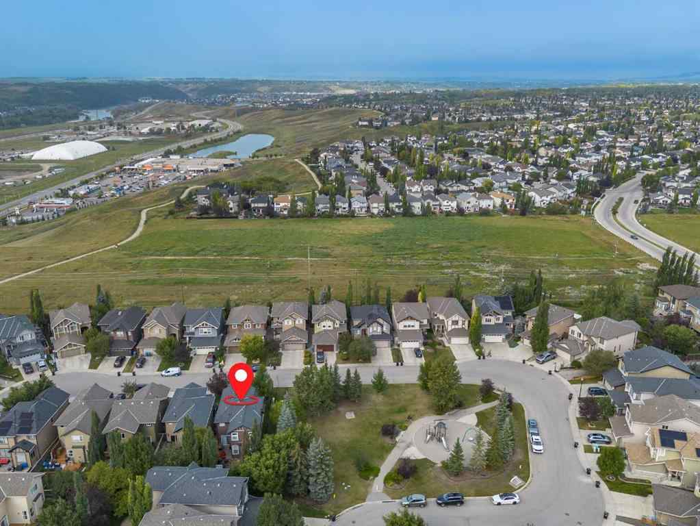 MLS® A2256154 - 477 Tuscany Ravine Road NW in Tuscany Calgary, Residential