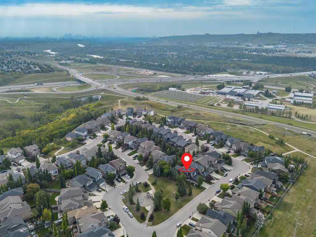 MLS® A2256154 - 477 Tuscany Ravine Road NW in Tuscany Calgary, Residential