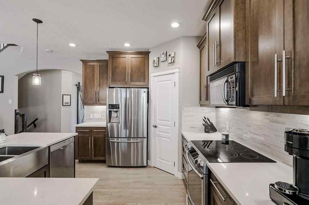 MLS® A2256154 - 477 Tuscany Ravine Road NW in Tuscany Calgary, Residential