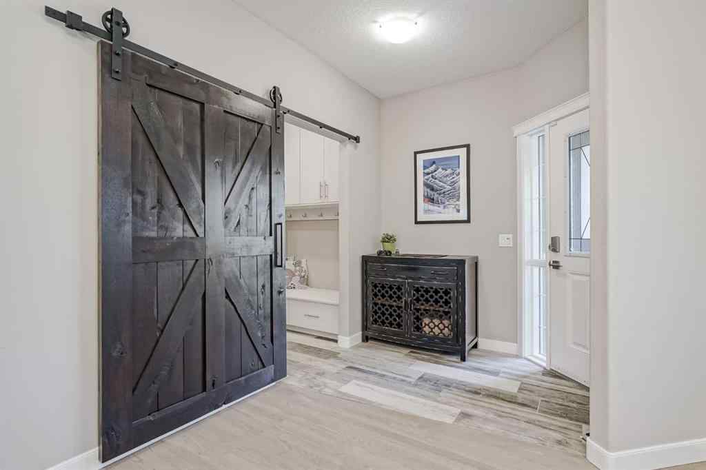 MLS® A2256154 - 477 Tuscany Ravine Road NW in Tuscany Calgary, Residential