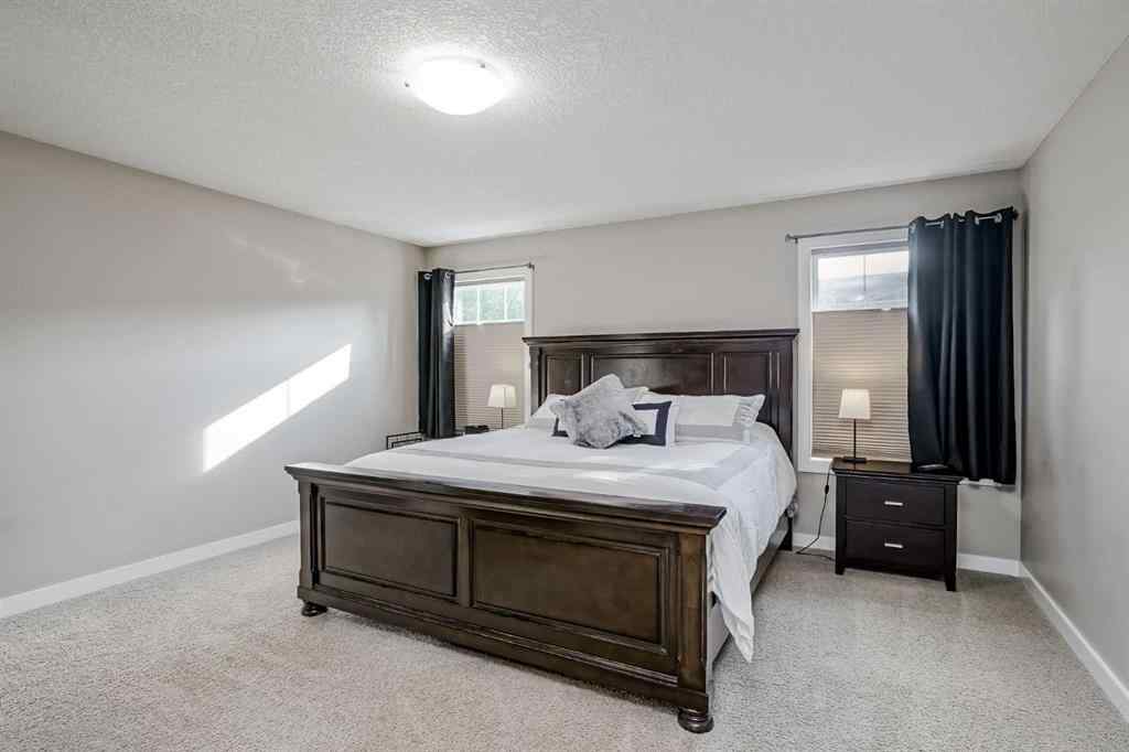 MLS® A2256154 - 477 Tuscany Ravine Road NW in Tuscany Calgary, Residential