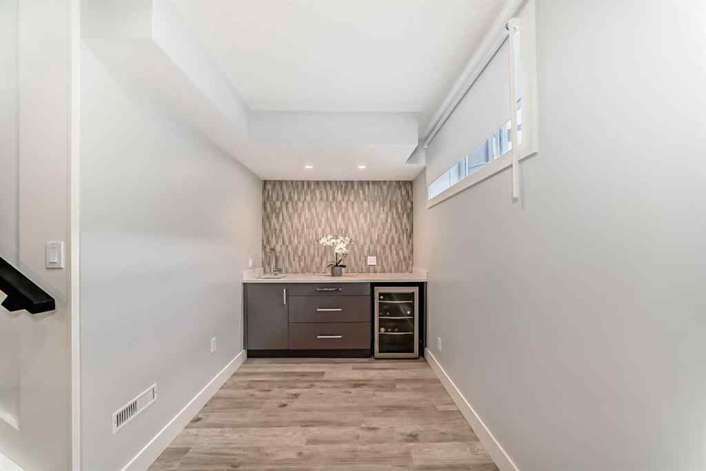 MLS® A2256160 - 213 Springbluff Boulevard SW in Springbank Hill Calgary, Residential