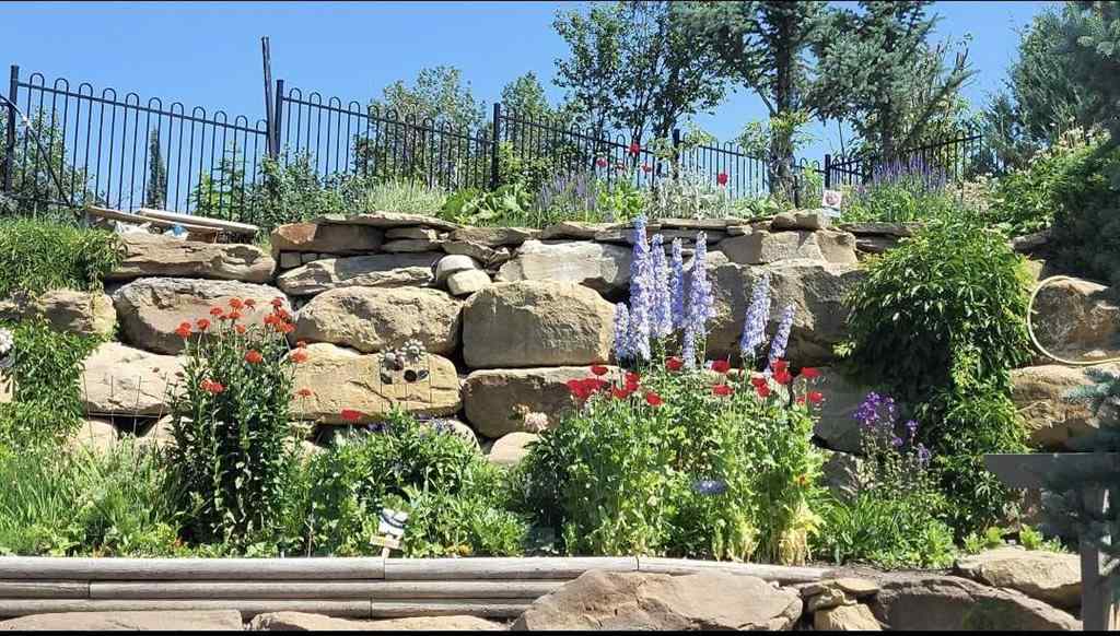 MLS® A2256160 - 213 Springbluff Boulevard SW in Springbank Hill Calgary, Residential