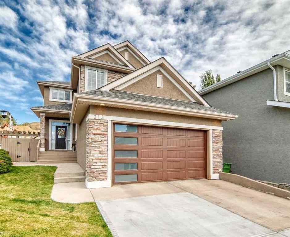 MLS® A2256160 - 213 Springbluff Boulevard SW in Springbank Hill Calgary, Residential