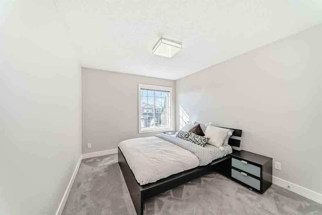 MLS® A2256160 - 213 Springbluff Boulevard SW in Springbank Hill Calgary, Residential
