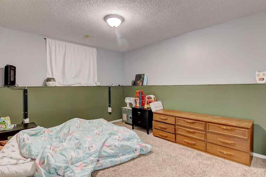 MLS® A2256177 - 9762 71 Avenue  in South Patterson Place Grande Prairie, Residential