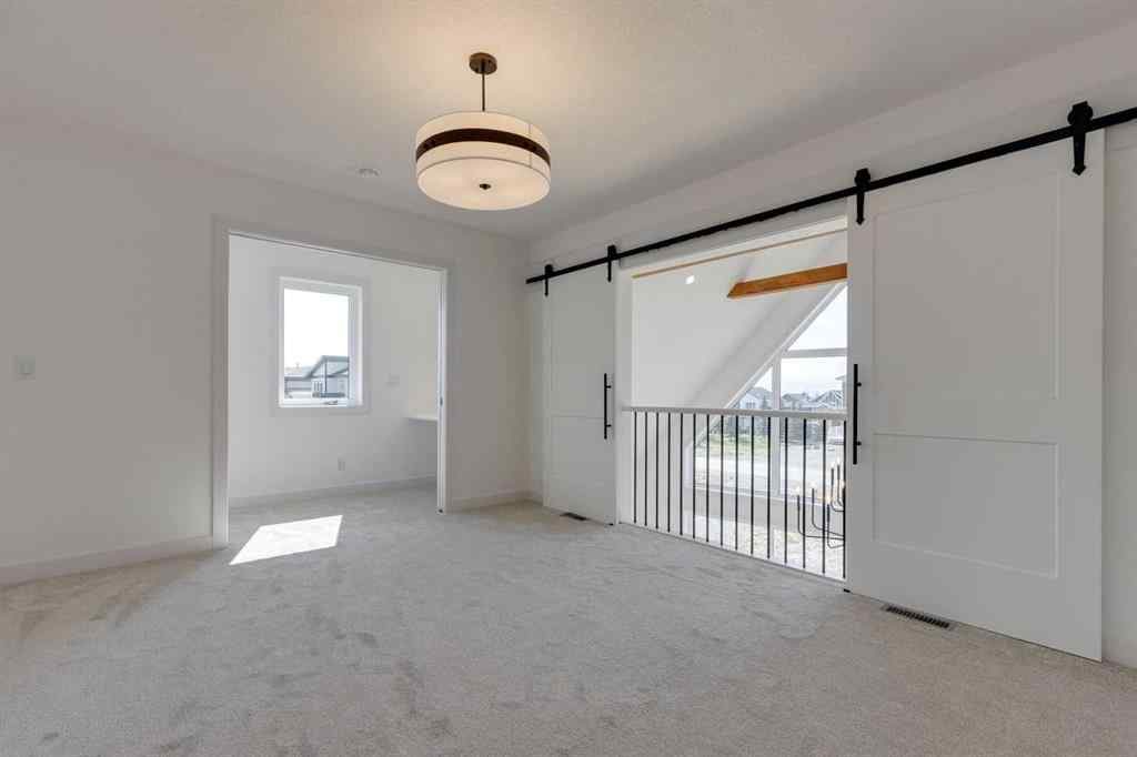 MLS® A2256184 - 648 Cottageclub Bend  in Cottage Club at Ghost Lake Rural Rocky View County, Residential