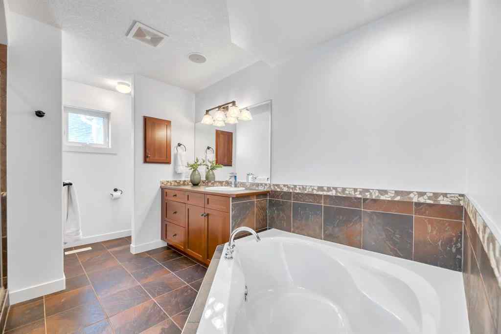 MLS® A2256191 - 39 Crestridge Way SW in Crestmont Calgary, Residential