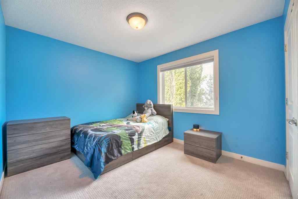 MLS® A2256191 - 39 Crestridge Way SW in Crestmont Calgary, Residential