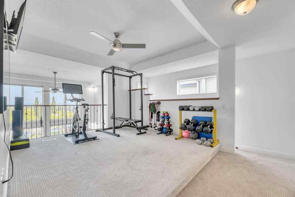 MLS® A2256191 - 39 Crestridge Way SW in Crestmont Calgary, Residential