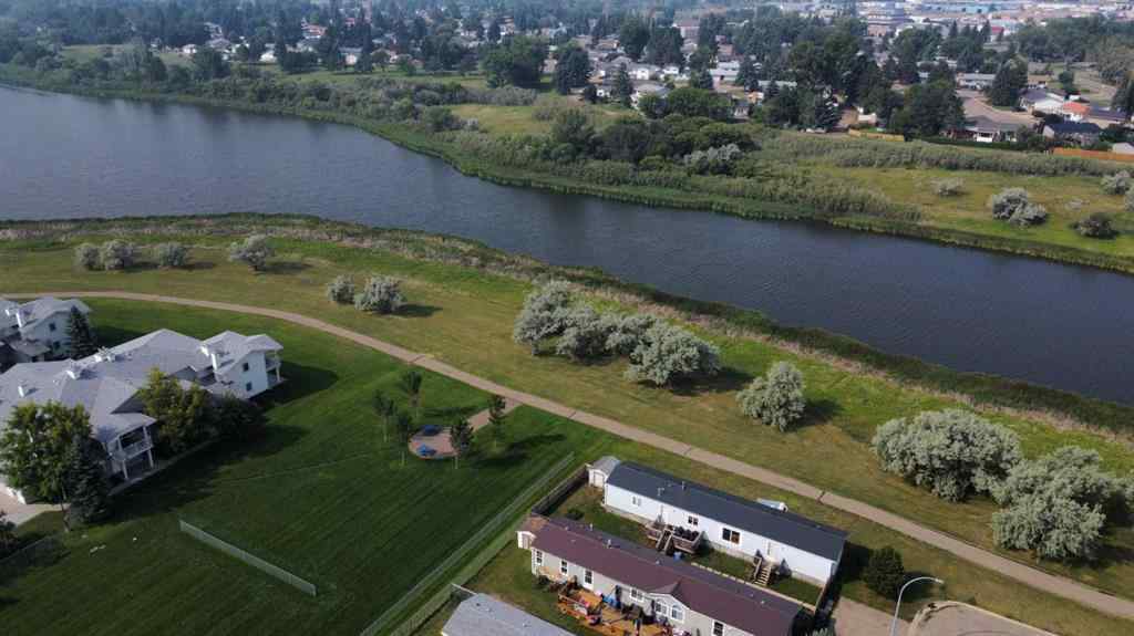 MLS® A2256192 - 19 Meadow Lake Gate  in Meadow Lake Brooks, Residential