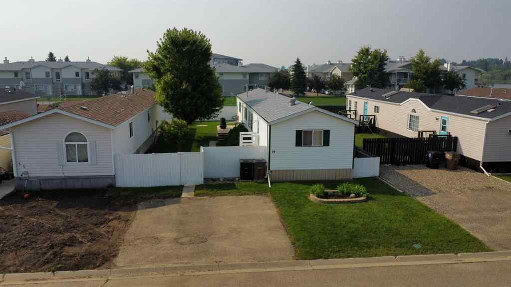 MLS® A2256192 - 19 Meadow Lake Gate  in Meadow Lake Brooks, Residential