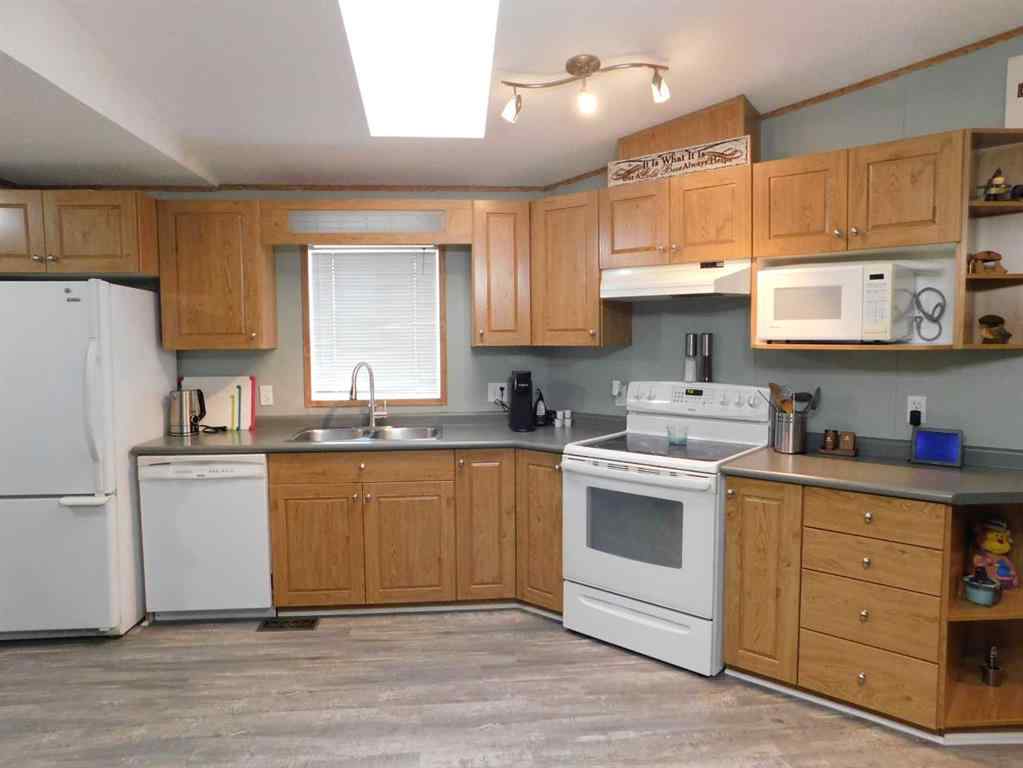 MLS® A2256192 - 19 Meadow Lake Gate  in Meadow Lake Brooks, Residential