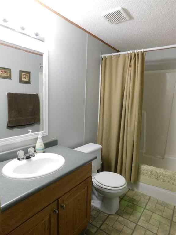 MLS® A2256192 - 19 Meadow Lake Gate  in Meadow Lake Brooks, Residential
