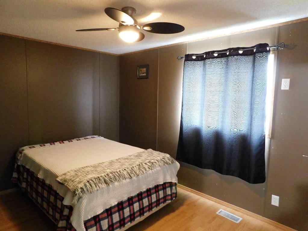 MLS® A2256192 - 19 Meadow Lake Gate  in Meadow Lake Brooks, Residential