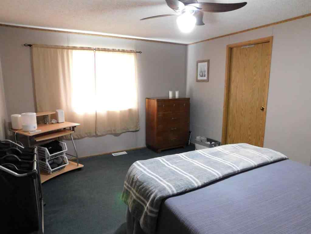 MLS® A2256192 - 19 Meadow Lake Gate  in Meadow Lake Brooks, Residential