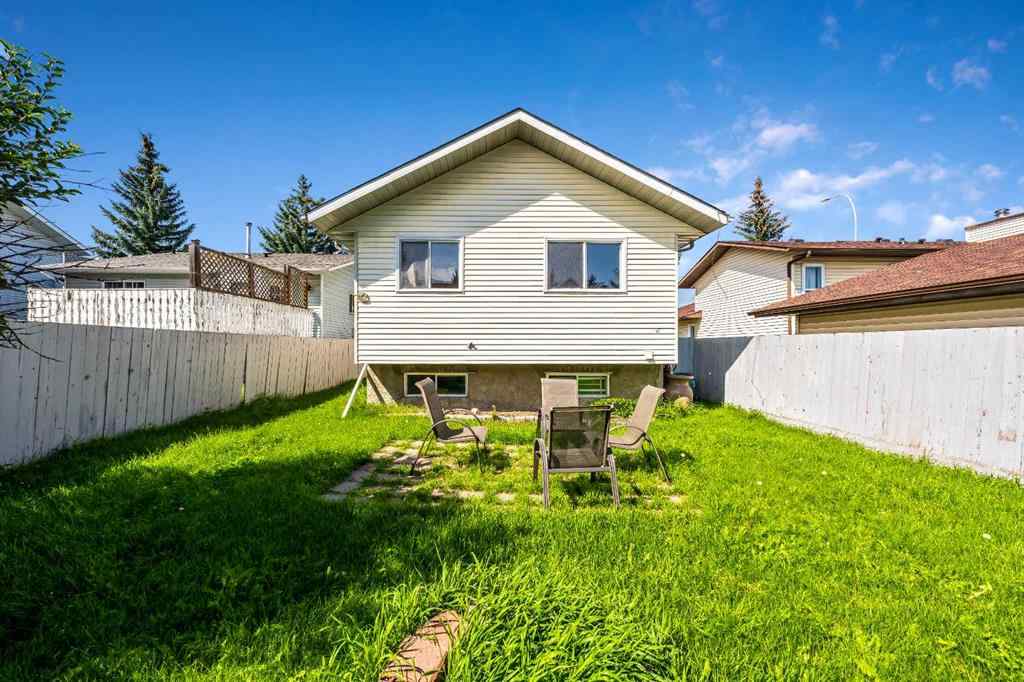 MLS® A2256226 - 680 Macewan Drive NW in MacEwan Glen Calgary, Residential