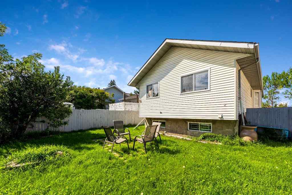 MLS® A2256226 - 680 Macewan Drive NW in MacEwan Glen Calgary, Residential
