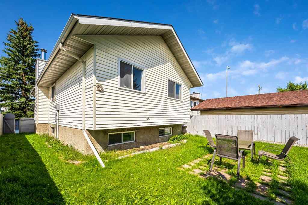 MLS® A2256226 - 680 Macewan Drive NW in MacEwan Glen Calgary, Residential