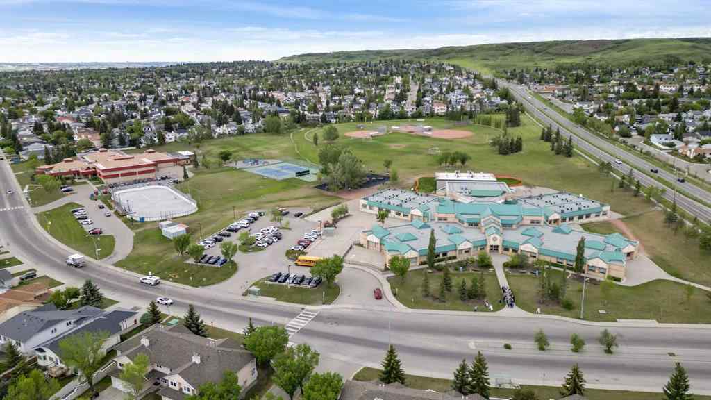 MLS® A2256226 - 680 Macewan Drive NW in MacEwan Glen Calgary, Residential