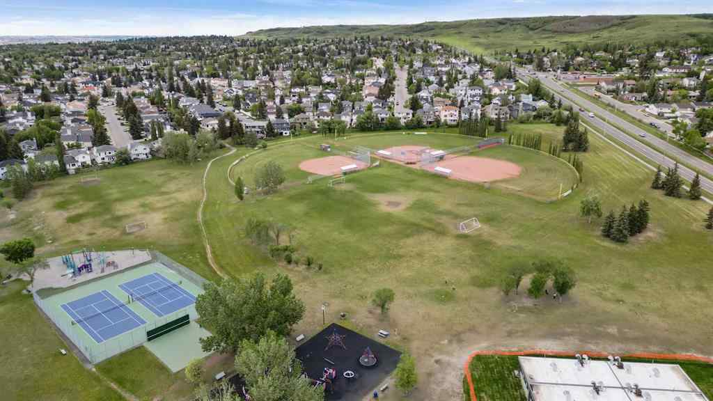 MLS® A2256226 - 680 Macewan Drive NW in MacEwan Glen Calgary, Residential
