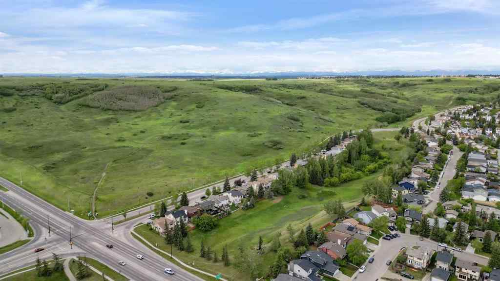 MLS® A2256226 - 680 Macewan Drive NW in MacEwan Glen Calgary, Residential