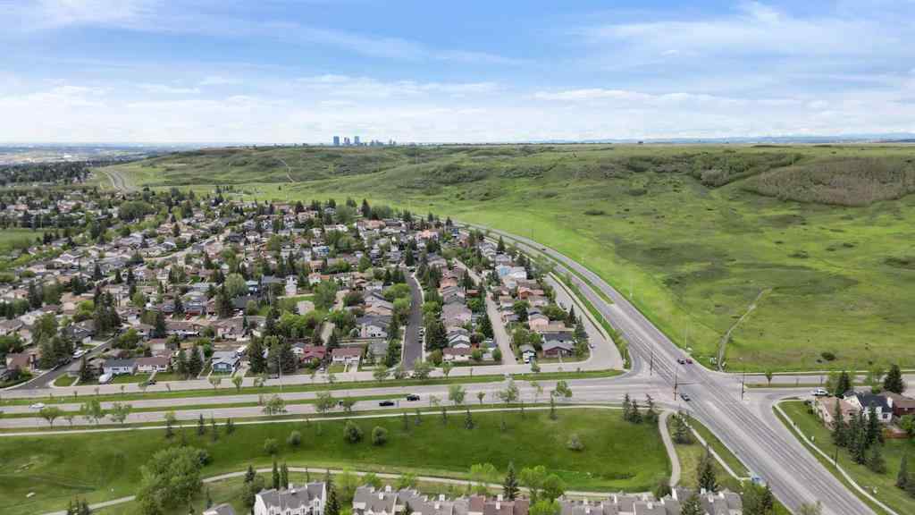 MLS® A2256226 - 680 Macewan Drive NW in MacEwan Glen Calgary, Residential