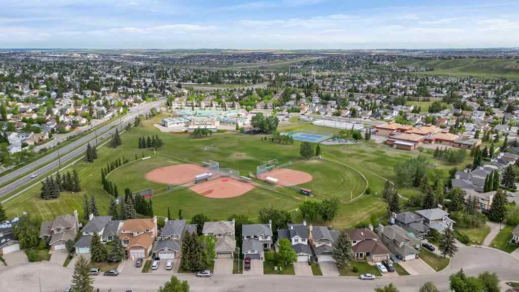 MLS® A2256226 - 680 Macewan Drive NW in MacEwan Glen Calgary, Residential