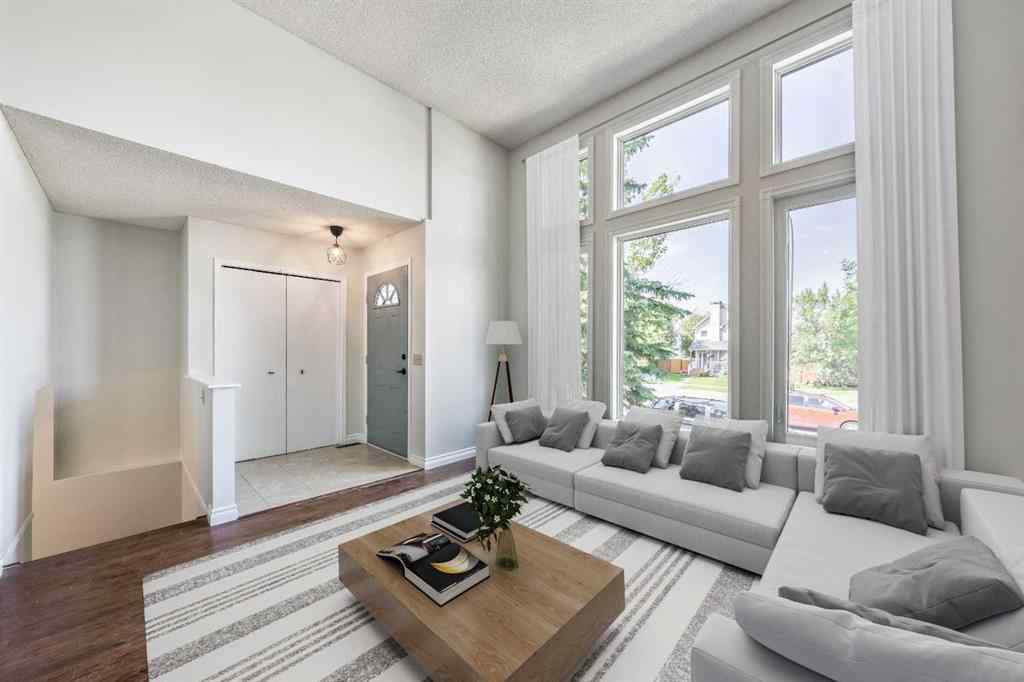 MLS® A2256226 - 680 Macewan Drive NW in MacEwan Glen Calgary, Residential
