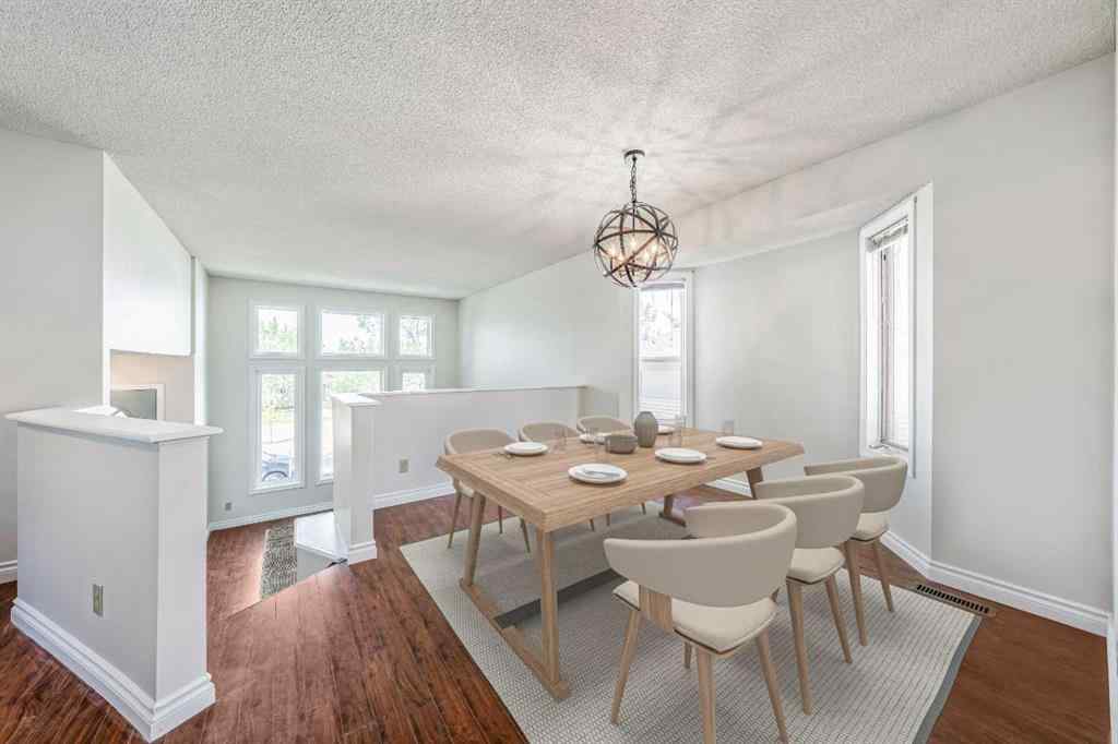 MLS® A2256226 - 680 Macewan Drive NW in MacEwan Glen Calgary, Residential