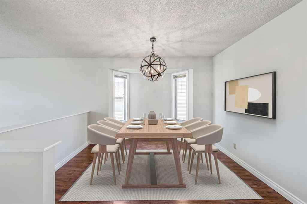 MLS® A2256226 - 680 Macewan Drive NW in MacEwan Glen Calgary, Residential