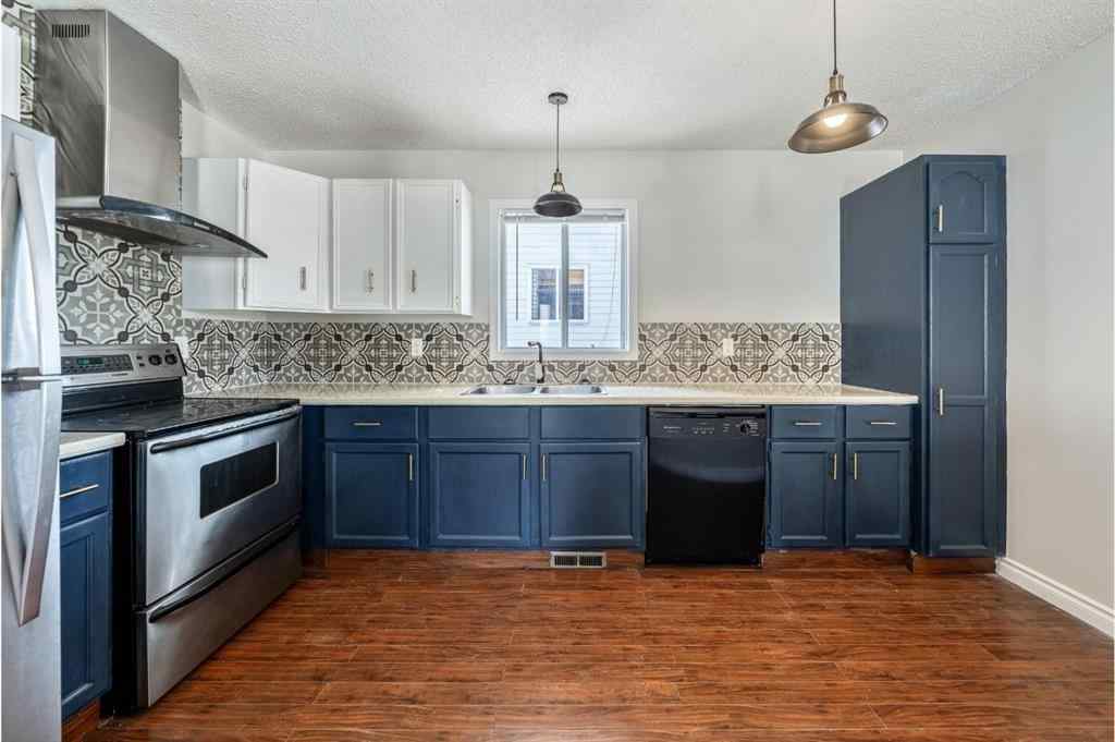 MLS® A2256226 - 680 Macewan Drive NW in MacEwan Glen Calgary, Residential