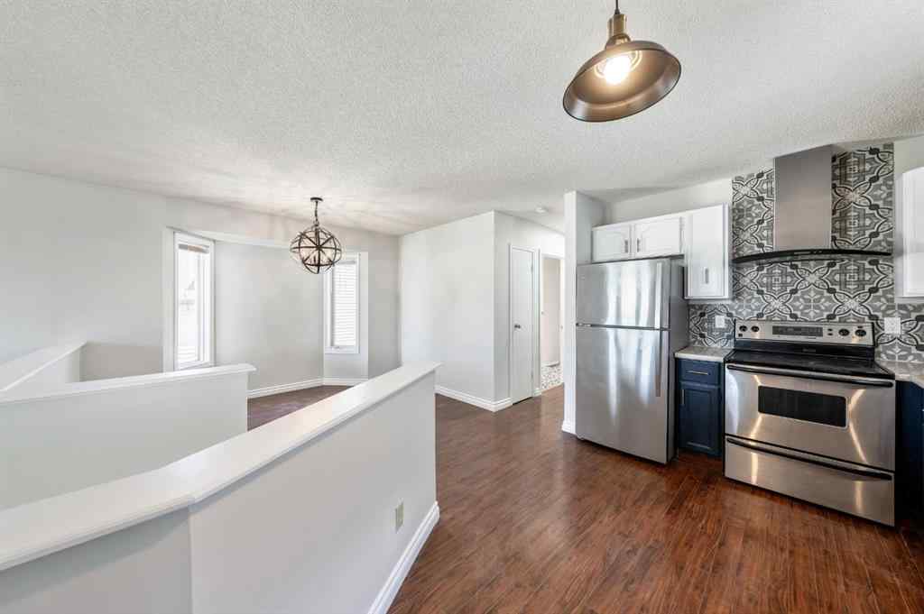 MLS® A2256226 - 680 Macewan Drive NW in MacEwan Glen Calgary, Residential
