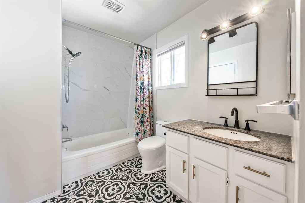 MLS® A2256226 - 680 Macewan Drive NW in MacEwan Glen Calgary, Residential