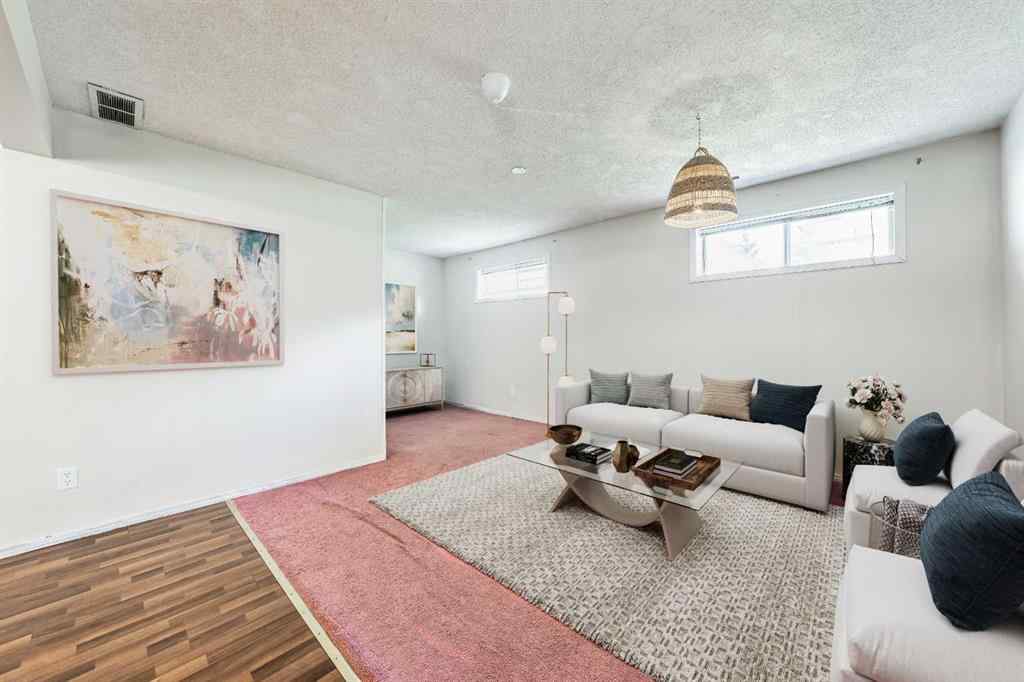MLS® A2256226 - 680 Macewan Drive NW in MacEwan Glen Calgary, Residential