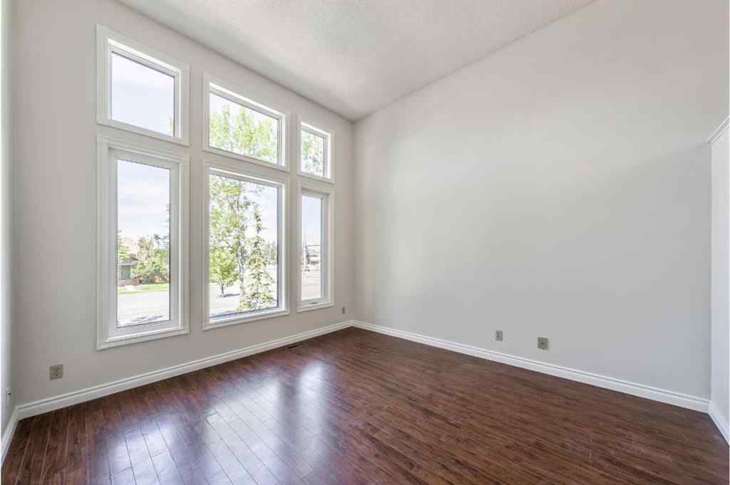MLS® A2256226 - 680 Macewan Drive NW in MacEwan Glen Calgary, Residential