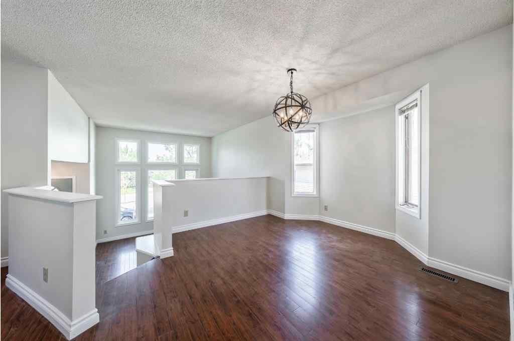 MLS® A2256226 - 680 Macewan Drive NW in MacEwan Glen Calgary, Residential